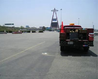 A Johnson-Frank pick-up truck in front of the Anaheim Stadium